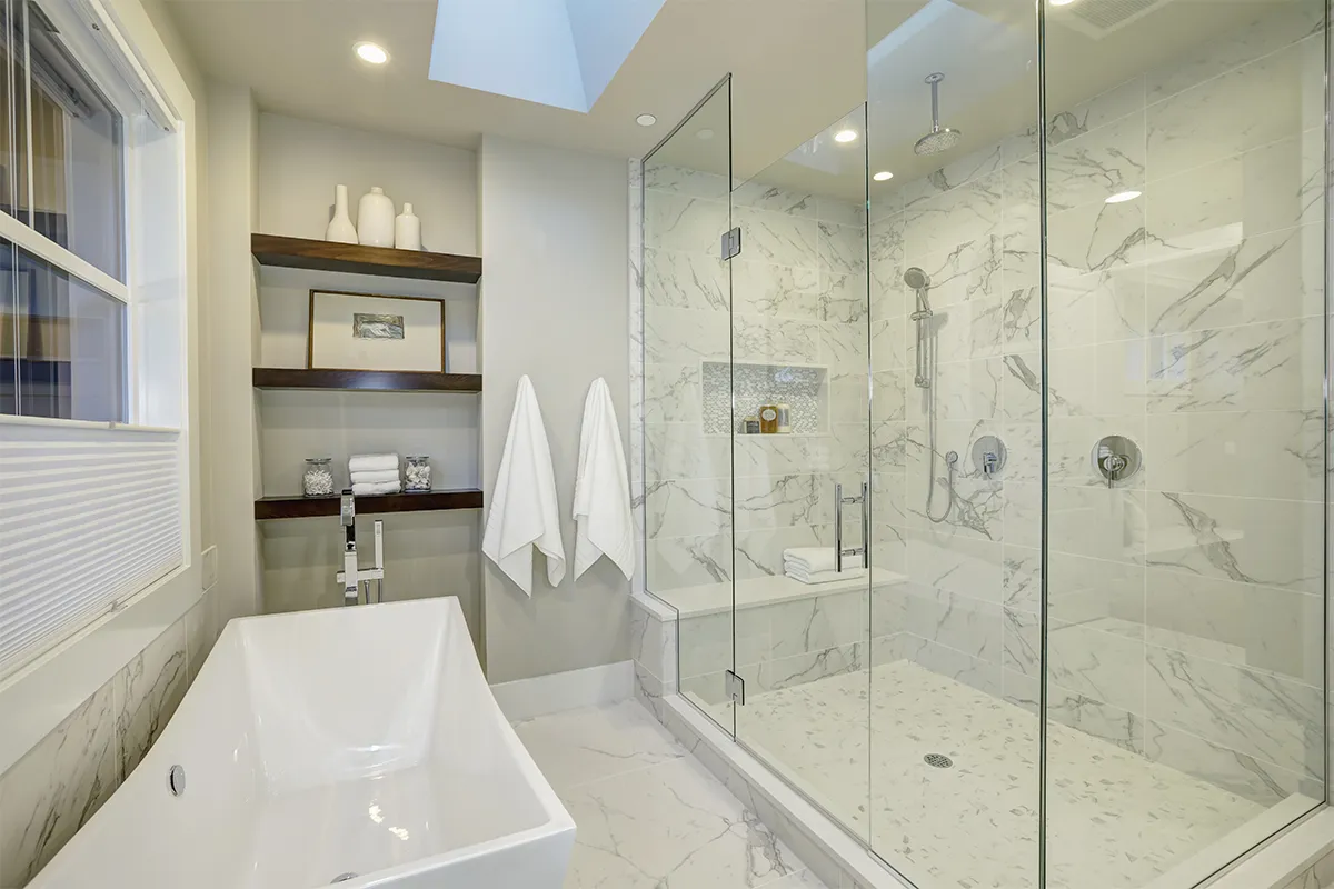 Bathroom remodeling North Hollywood with marble tile freestanding tub and walk in shower, Athenian Builders