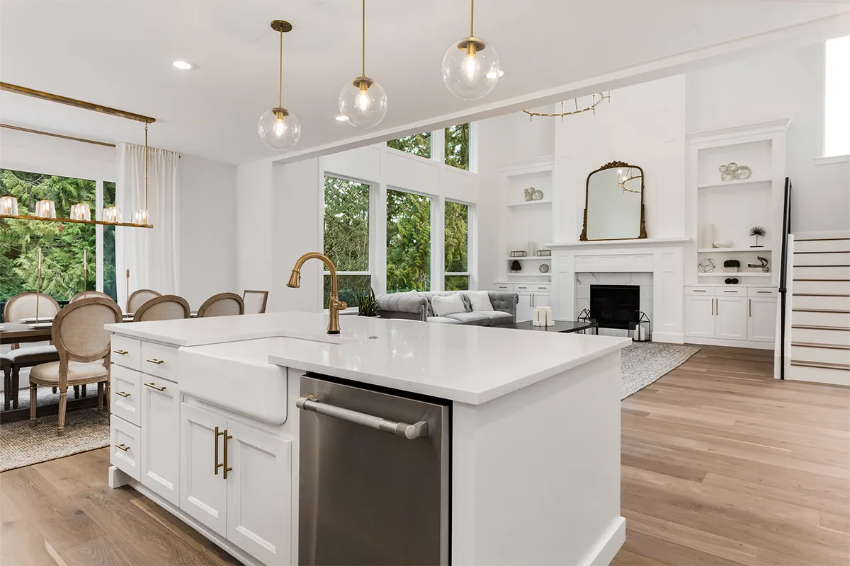 Kitchen remodeling Los Angeles with white kitchen island quartz countertop and farmhouse sink, Athenian Builders