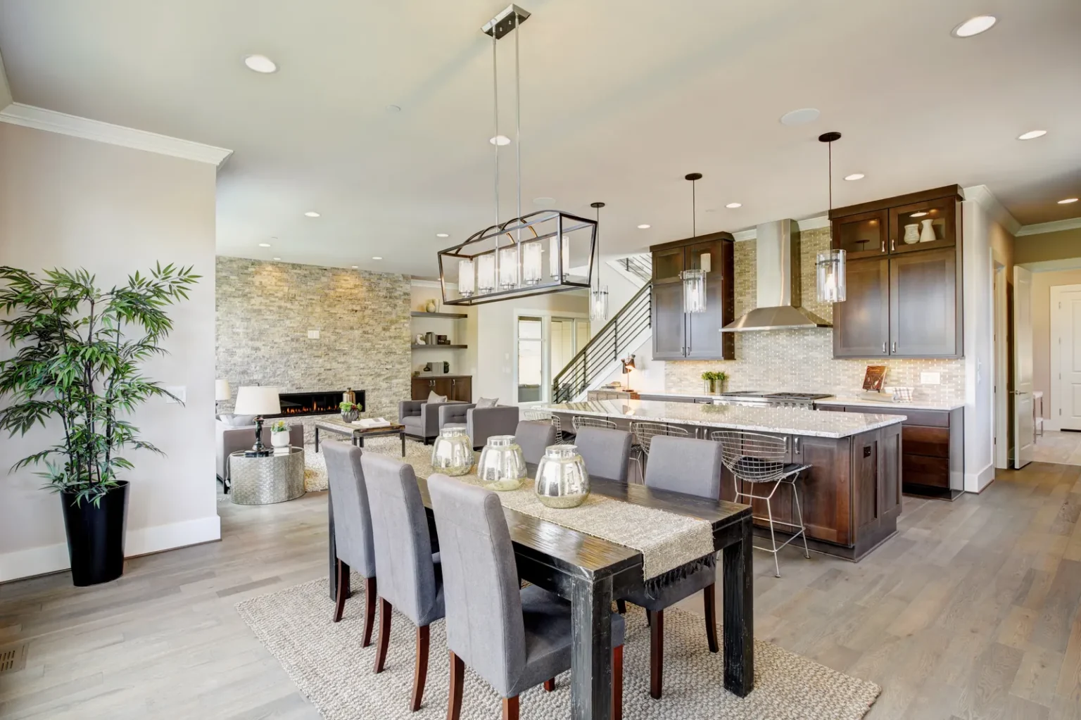 Dining area open floor plan kitchen in Encino by Athenian Builders