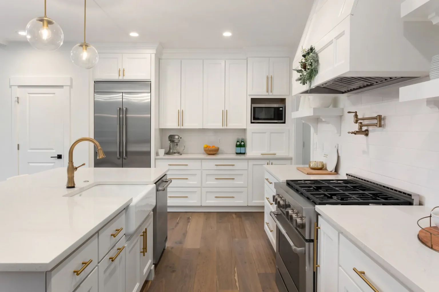 Farmhouse sink brass pot filler kitchen in Los Angeles by Athenian Builders