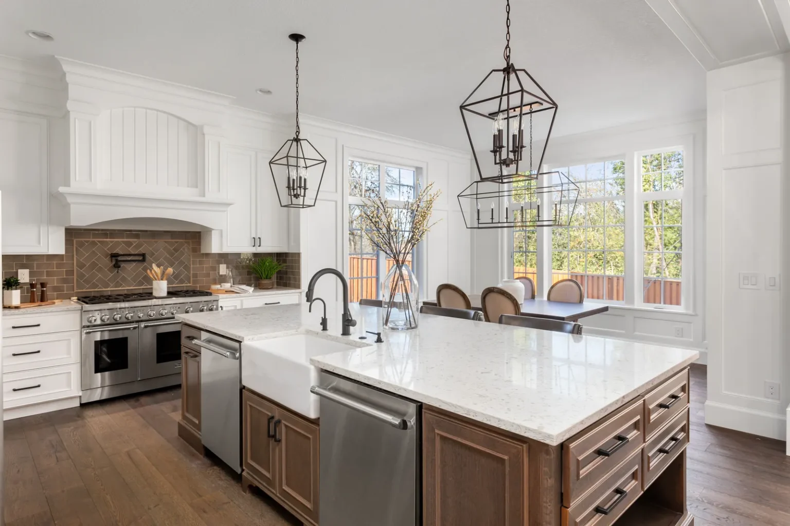 Farmhouse sink pro range herringbone backsplash in Sherman Oaks by Athenian Builders