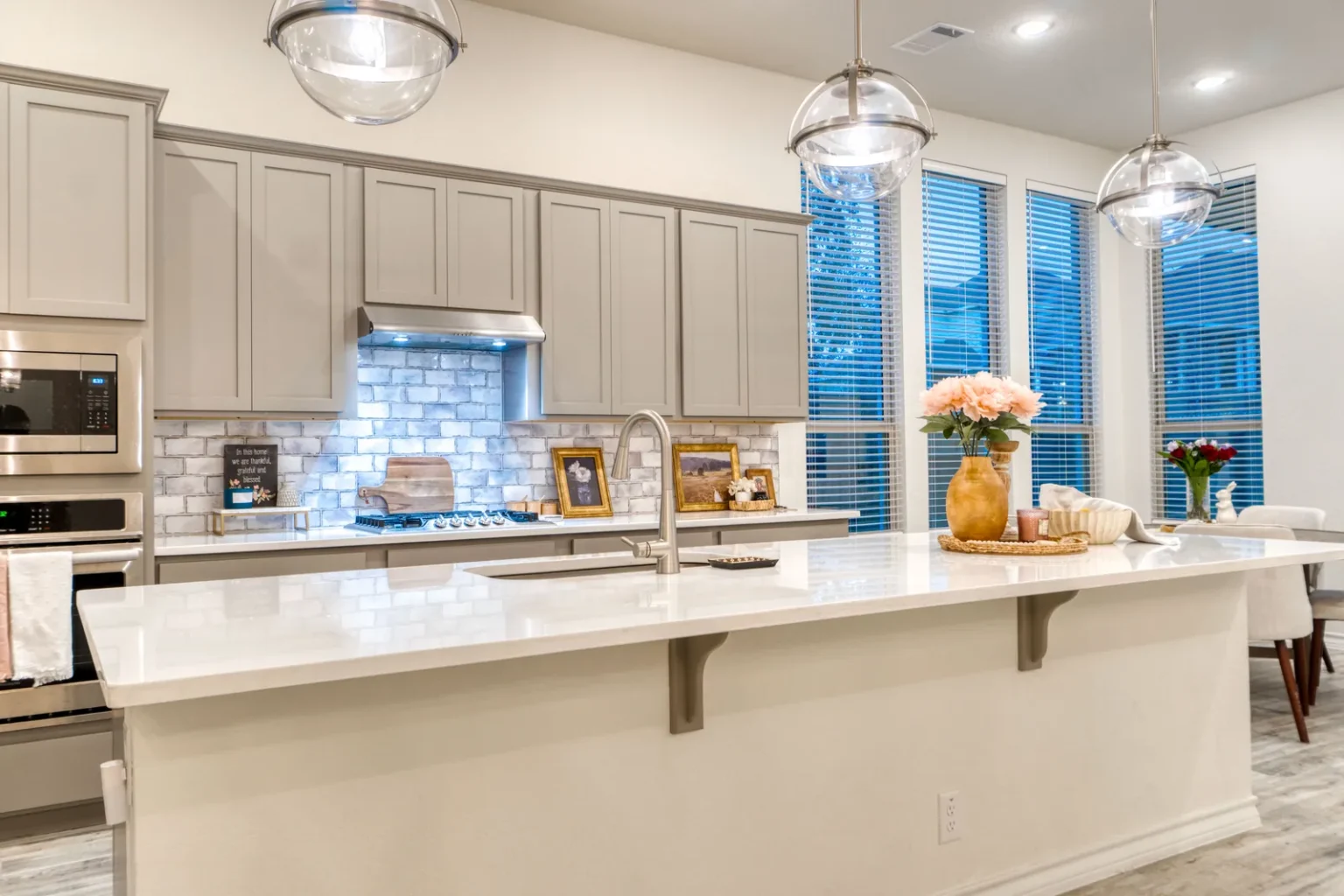 Gas cooktop range hood backsplash in North Hollywood by Athenian Builders