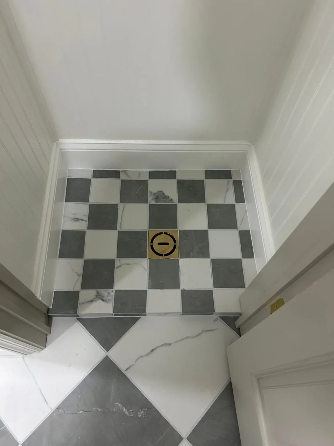 Bathroom checkerboard floor in Beverly Hills by Athenian Builders