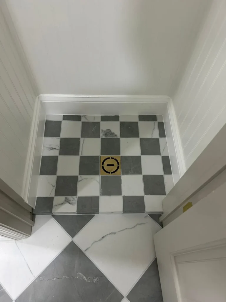 Bathroom checkerboard floor in Beverly Hills by Athenian Builders