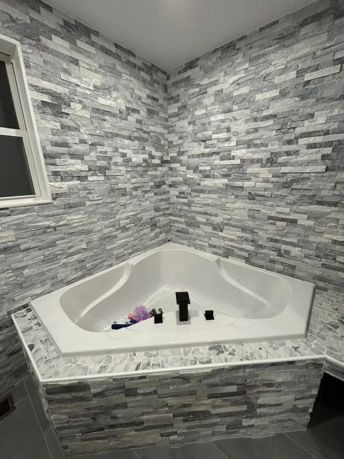 Bathroom mosaic tub in Encino by Athenian Builders